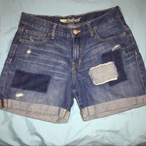 Distressed denim shorts